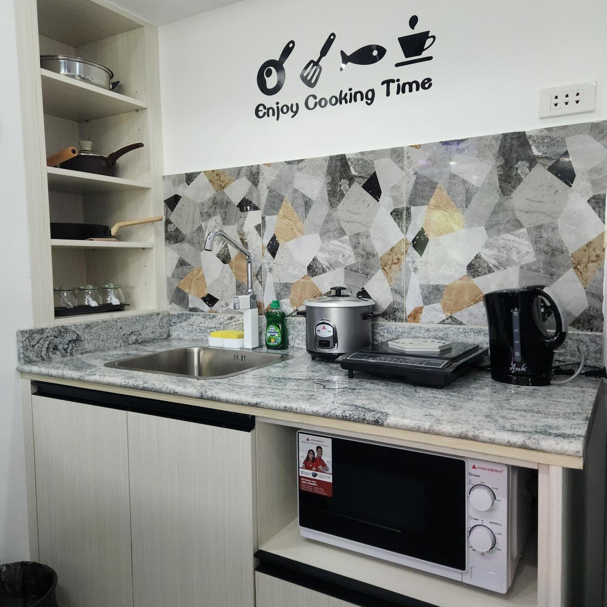 Condo Azur Suites B316 Near Airport, Netflix, Stylish, Cozy With Swimming Pool 麦克坦 外观 照片
